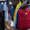 lowsection of Ukrainian immigrants with luggage