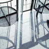 businesswoman walking through revolving door businesswoman walking through revolving door