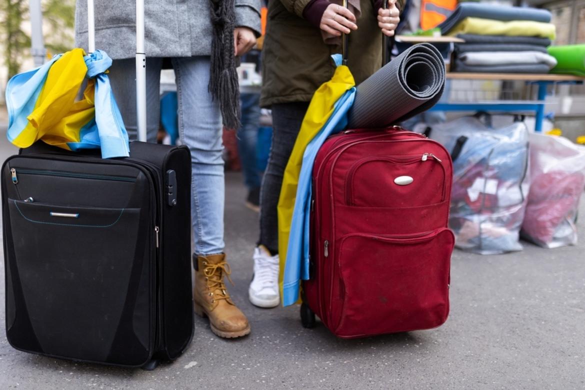 lowsection of Ukrainian immigrants with luggage